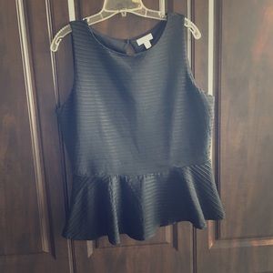 Black peplum top, sleeveless with black stripes